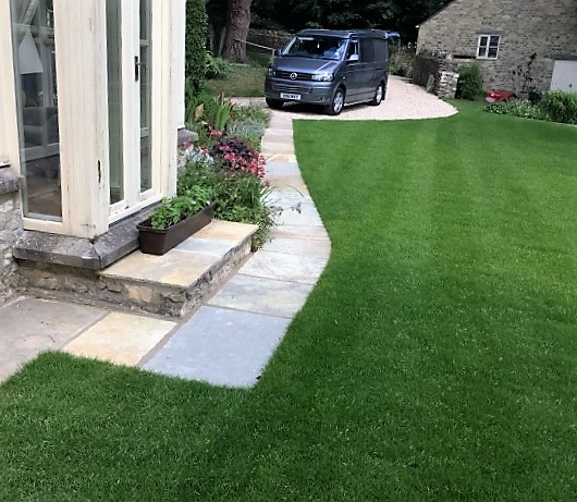 Indian limestone paving and lawn